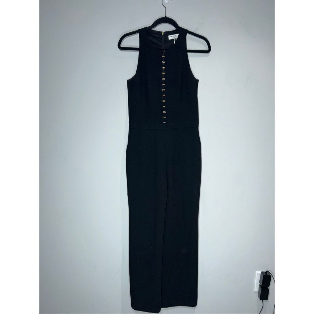Trina Turk Amelie jumpsuit in black crepe with gold-tone grommets size 2
